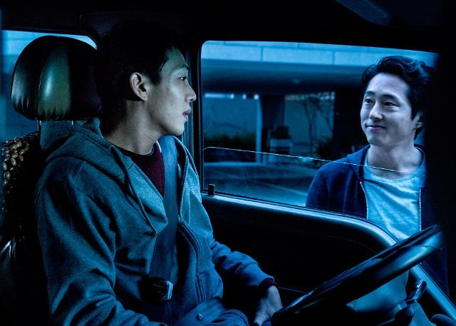 "Burning" starring Yoo Ah-in (left) and Steven Yeun (Pinehouse Film/Nowfilm)