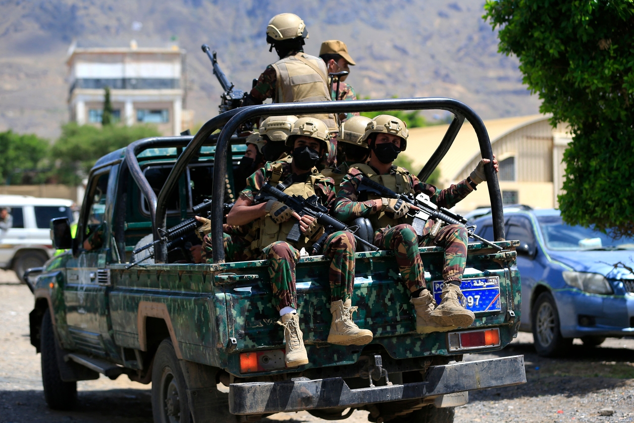 Houthi fighters conduct a patrol in Yemen. [AFP]