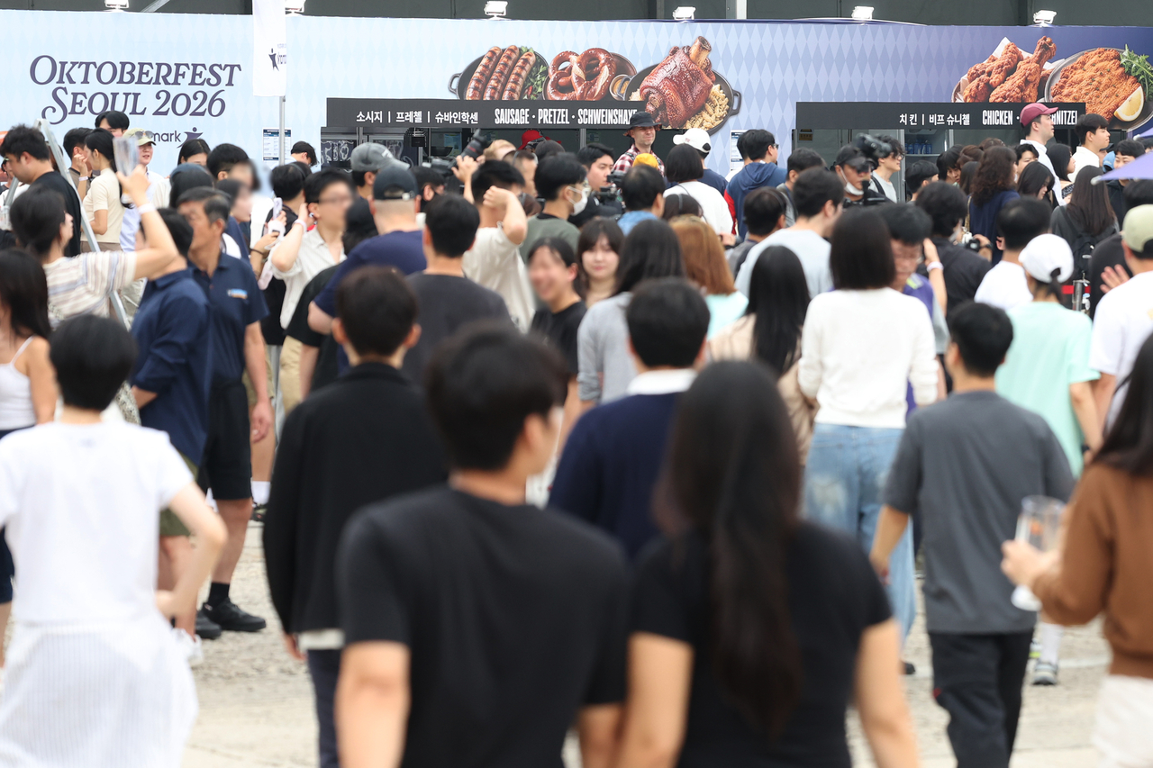Visitors gather at Oktoberfest Seoul 2026 for German beer and food. (Yonhap)