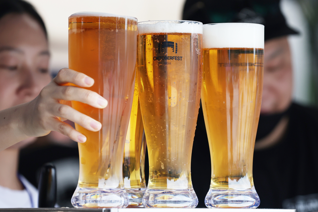 Oktoberfest Seoul 2026 features a variety of German beer and traditional Bavarian dishes as well as German folk music and performances. (Yonhap)