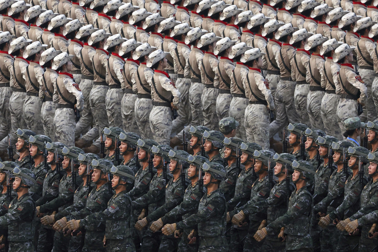 Military personnel take part in a military parade in front of Tiananmen Gate in Beijing in September 2025. (AP-Yonhap)