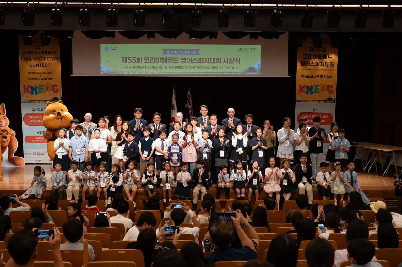 Participants of the 55th Korea Herald English Speech Contest pose for a group photo on Friday in Jongno-gu, Seoul. (The Korea Herald)