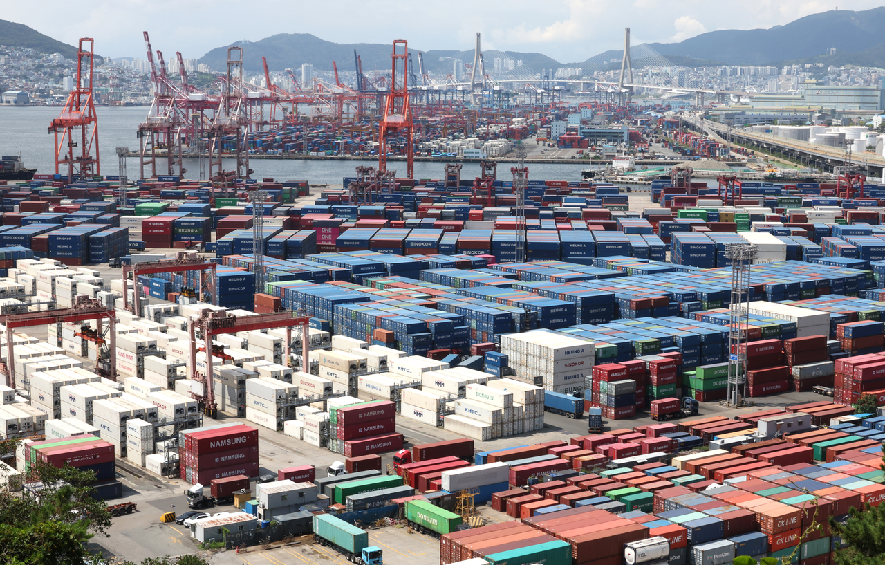 Containers are stacked at a port in the southeastern city of Busan, in this Sept. 1, file photo. (Yonhap)