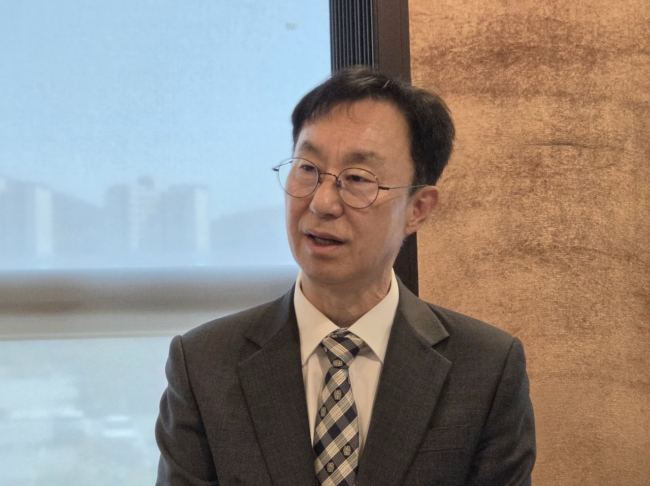 Im Jae-man, president of the Korea Research Institute for Human Settlements, speaks at a press briefing in Sejong on Tuesday, saying the institute will focus on improving research quality and producing work with high policy relevance.