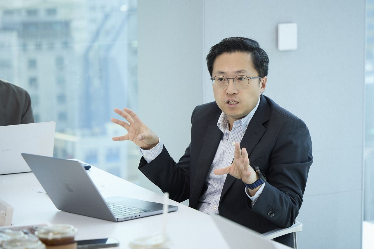 Kim Ji-hoon, head of SK Telecom's AI business division, speaks at the "Modu's AI Group Briefing" held Tuesday at SKT T Tower in Jung-gu, Seoul. [SK Telecom]