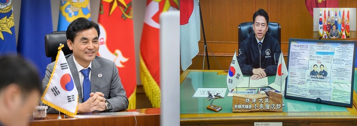 Defense Minister Ahn Gyu-back (Left) speaks with Japanese Defense Minister Shinjiro Koizumi over a video call, in this file photo provided by Seoul's defense ministry on Tuesday. (Yonhap)