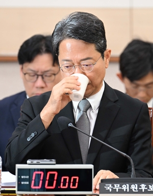 COVID-19 drug controversy clouds justice minister nominee's confirmation