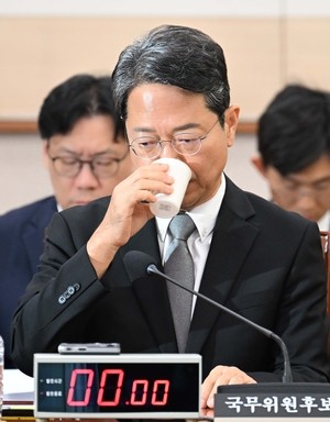 COVID-19 drug controversy clouds justice minister nominee's confirmation
