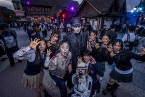 Walk with giraffes by day and outrun zombies by night at Everland