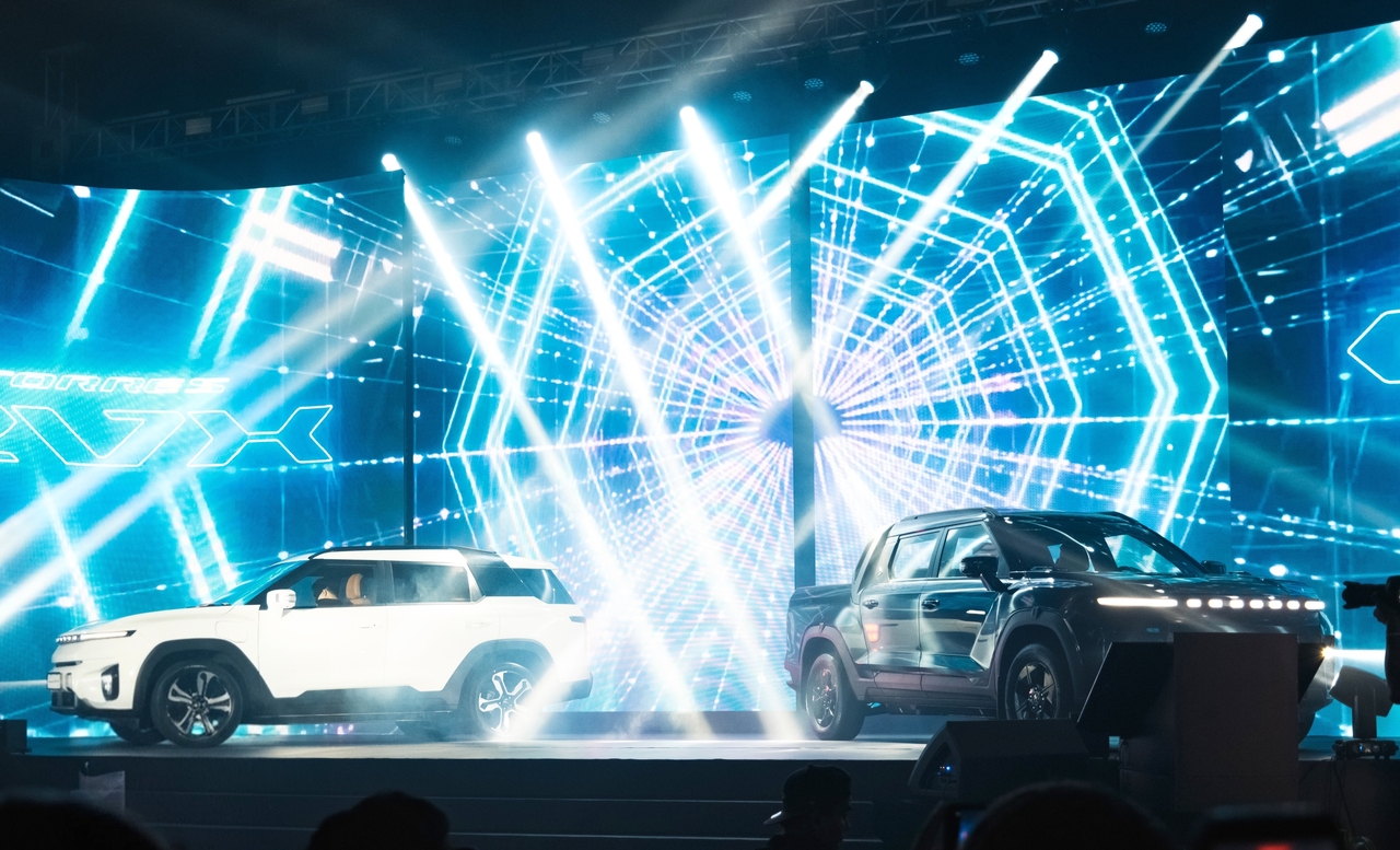 The Torres EVX (left) and Musso EV unveiled at KGM's brand launch event in Yangon, Myanmar, in August. [KGM]