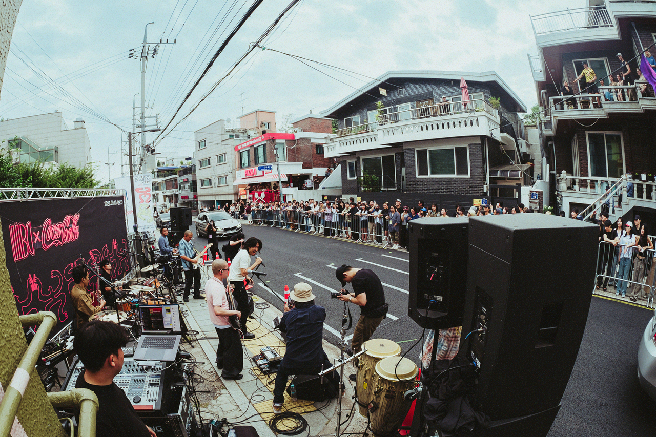Indie rock band Yangbans perform on the outdoor stage during Block Party in Haebangchon, Yongsan-gu, Seoul, Sunday. (Chris Mata)