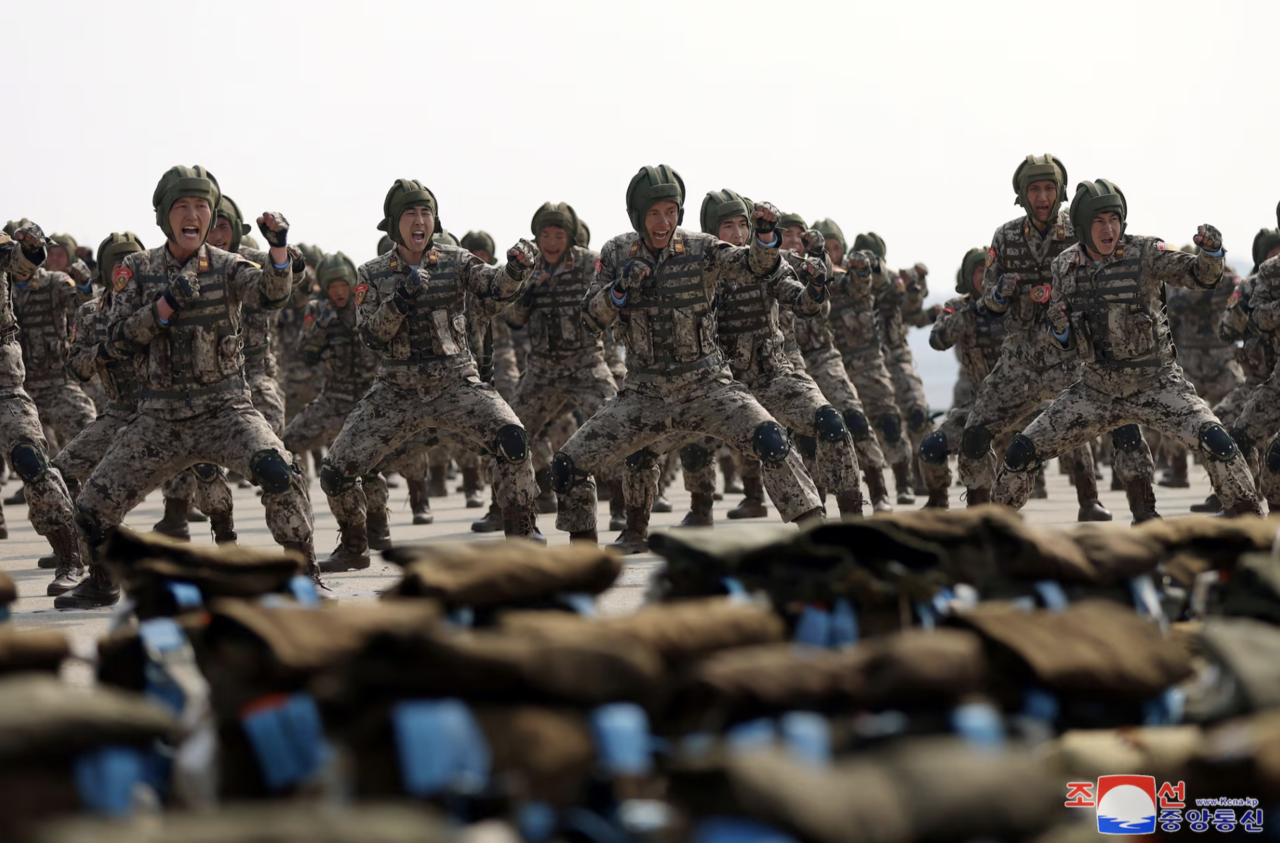North Korean soldiers participate in a demonstration during training by the Korean People’s Army’s air and amphibious combat units, in this photo released in March 2024. (KCNA via Yonhap)
