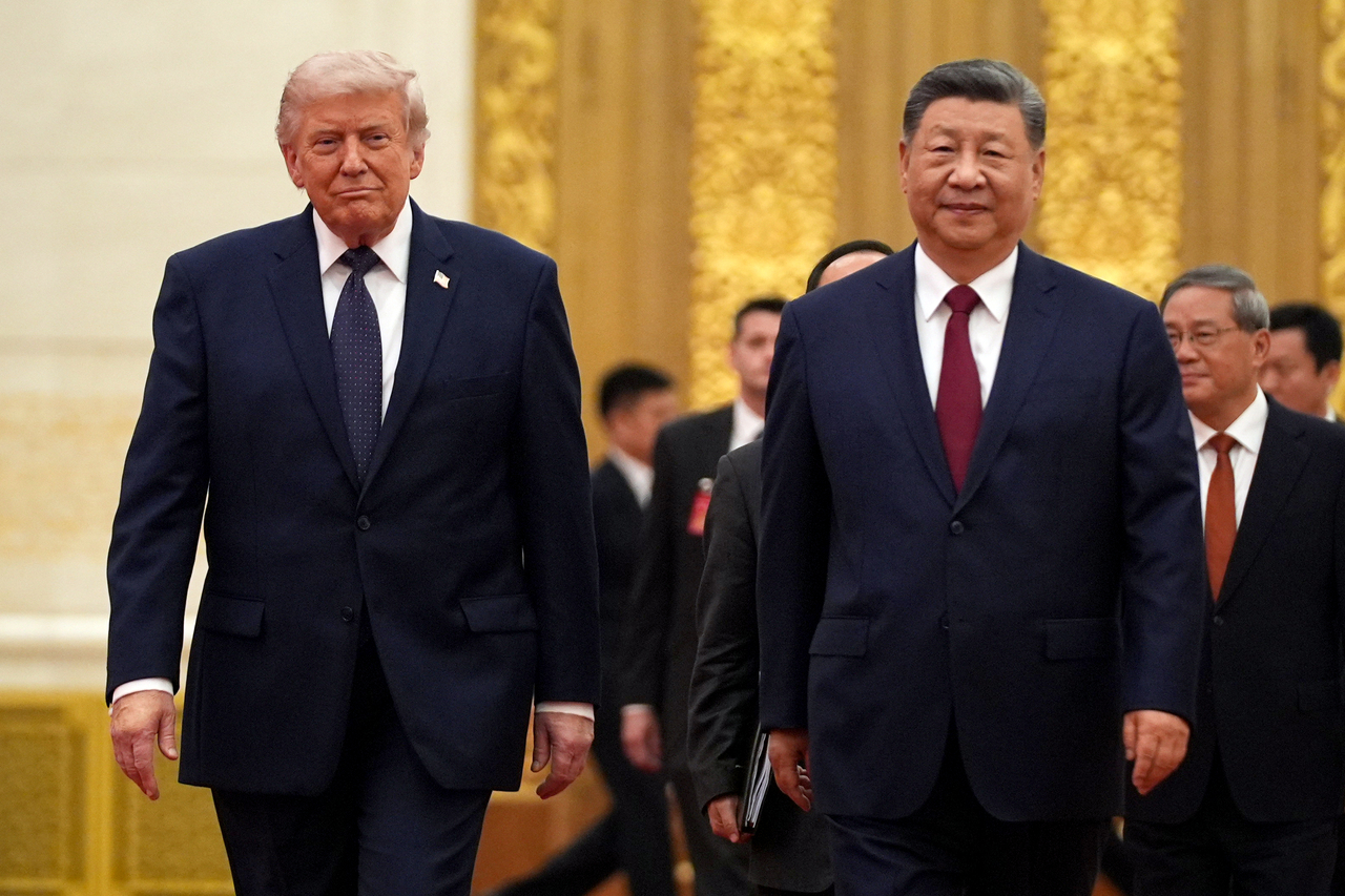 US President Donald Trump (left) and Chinese President Xi Jinping [AP]