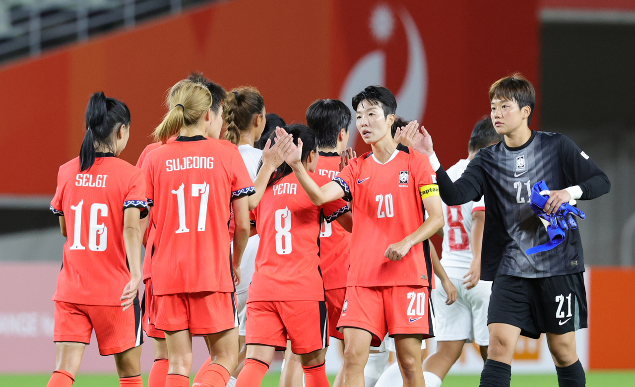 South Korean players celebrate after their 5-0 victory over Myanmar in the opening Group F match of the women's football tournament at the 2026 Aichi-Nagoya Asian Games, held at Yanmar Stadium Nagai in Osaka, Japan, on Monday. [Yonhap]
