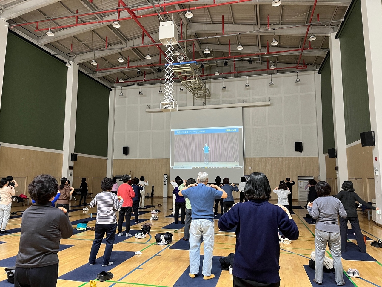 Exercise club members take part in a community fitness session in Nowon-gu, Seoul.