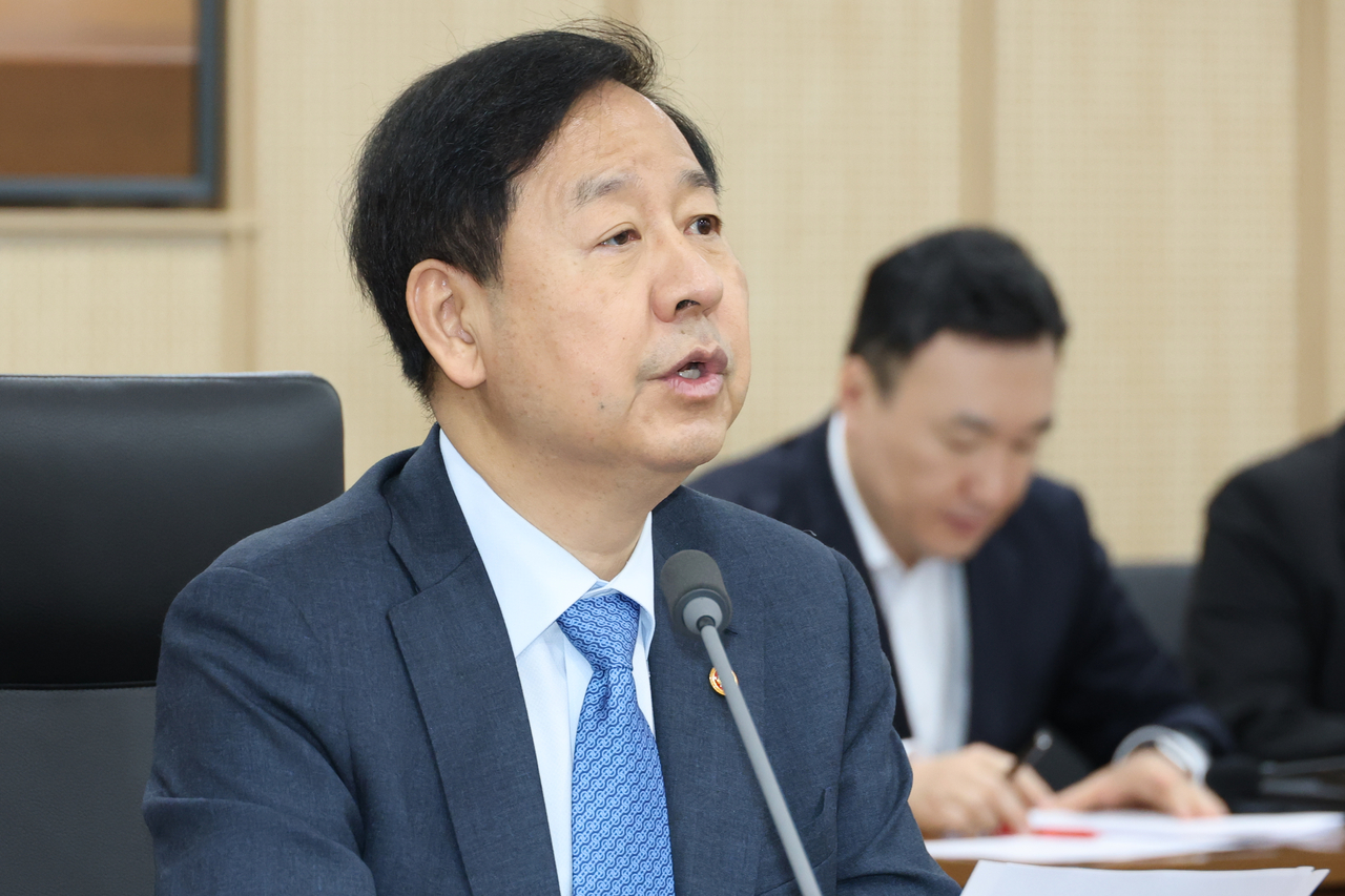 Finance Minister Koo Yun-cheol speaks during a meeting in the central city of Sejong on Friday. (Yonhap)