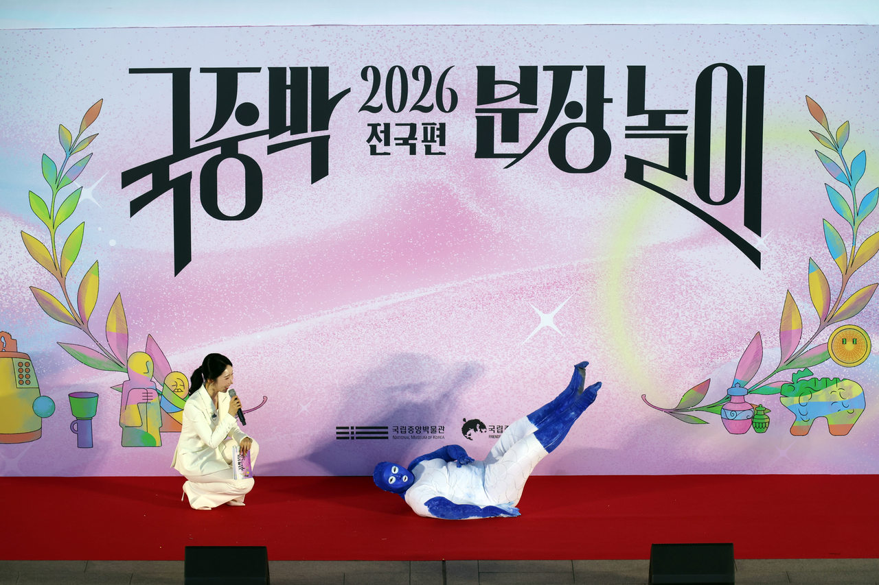 A contestant dressed up as the "White Porcelain Carp-shaped Water Dropper" for the “2026 Dress Like a Museum Exhibit” at the National Museum of Korea, in Yonsan-gu, Seoul on Saturady. (Yonhap)