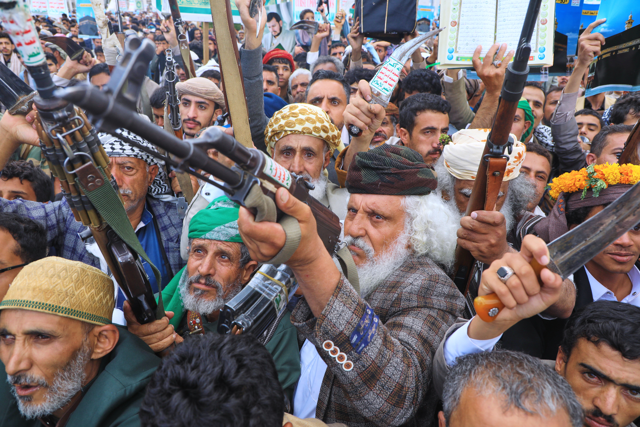 Supporters of Yemen's Houthi rebels raise their rifles during a rally in support of the group and to protest Saudi Arabia's accusation that the Houthis targeted Islam's holiest site of Mecca, in Sanaa, Yemen, Friday. (AP)