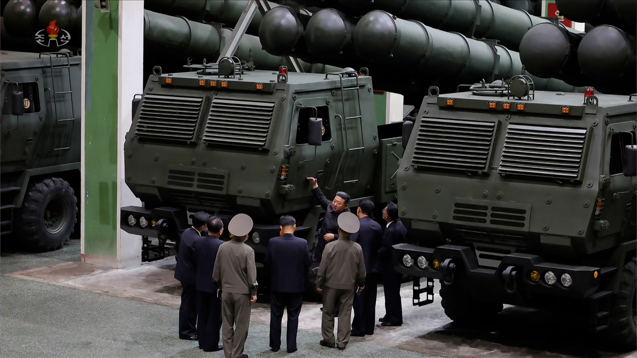 North Korean leader Kim Jong-un inspects a munitions factory in this photo captured from North Korea's official Korean Central TV on Saturday. (Yonhap)
