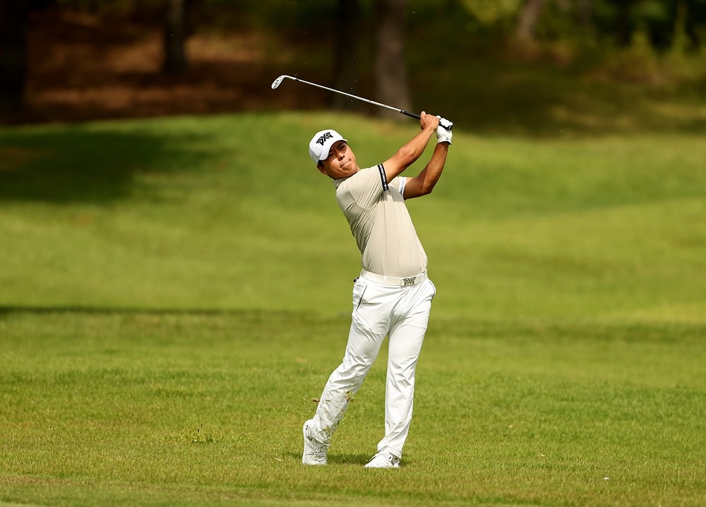 Shin Sang-hoon plays his second iron shot on hole 3 during the third round of the KPGA Tour Golfzon Open on Saturday.
