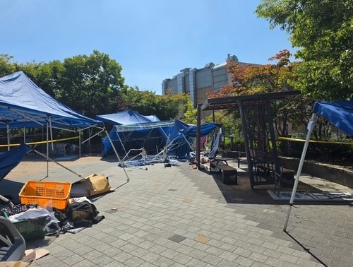 This photo provided by the Gyeonggi Province fire service shows the site of an accident at a park in Anseong, Gyeonggi Province, Saturday,  in which a truck killed two people and injured five others. (Gyeonggi-do Fire & Disaster Headquarters via Yonhap)