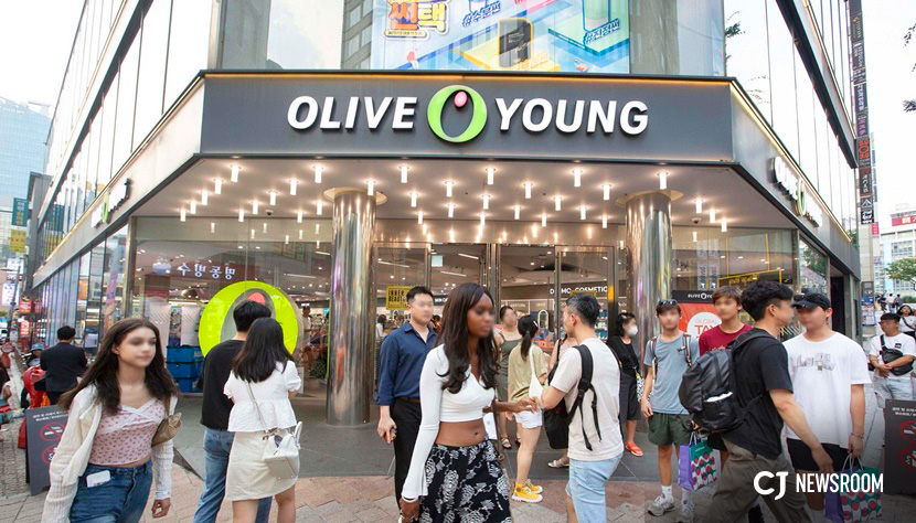 Pedestrians walk past an Olive Young store in Seoul. (CJ Olive Young)