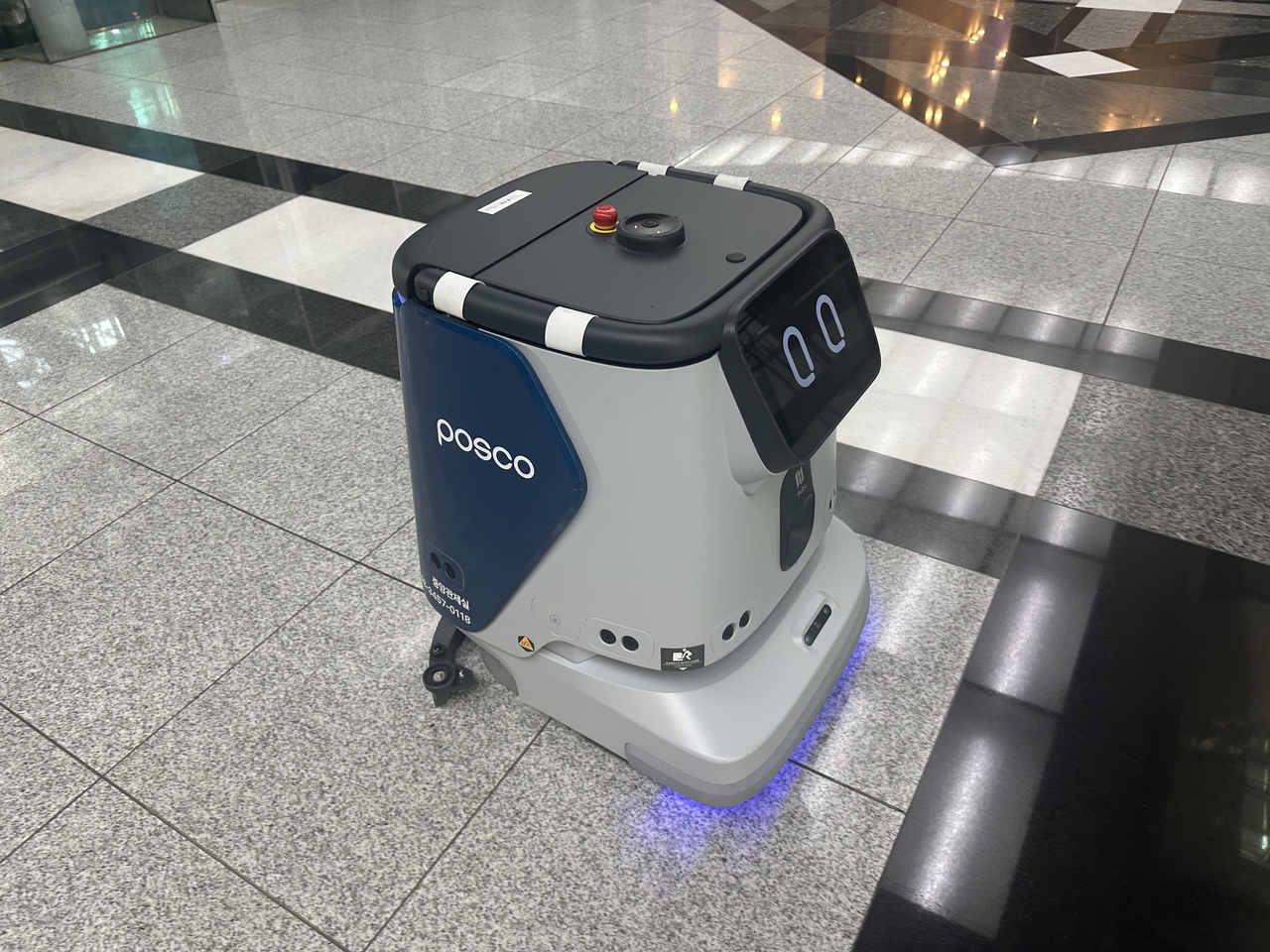 A cleaning robot operates in the lobby of Posco Center in southern Seoul. (Posco Group)