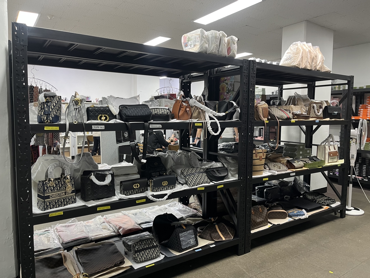 Counterfeit goods seized from an underground warehouse in Jangan-dong, Seoul. [Seoul Metropolitan Government]