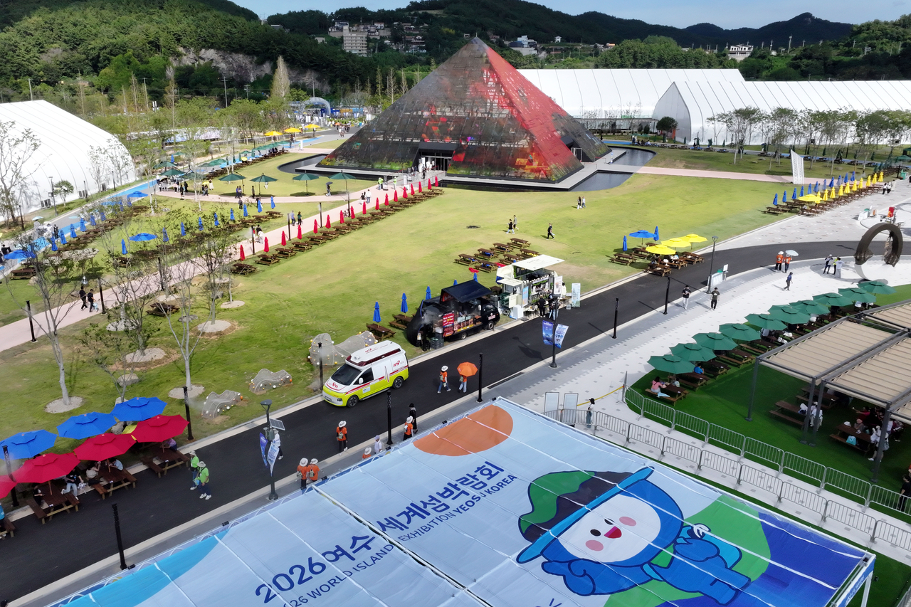 Visitors walk through the main venue of the 2026 Yeosu World Islands Expo, which opened Friday in the Jinmo district of Dolsan-eup, Yeosu, South Jeolla Province. The expo runs through Nov. 4 — 61 days in total — at the Jinmo main venue and on the islands of Gaedo and Geumodo. [Yonhap]