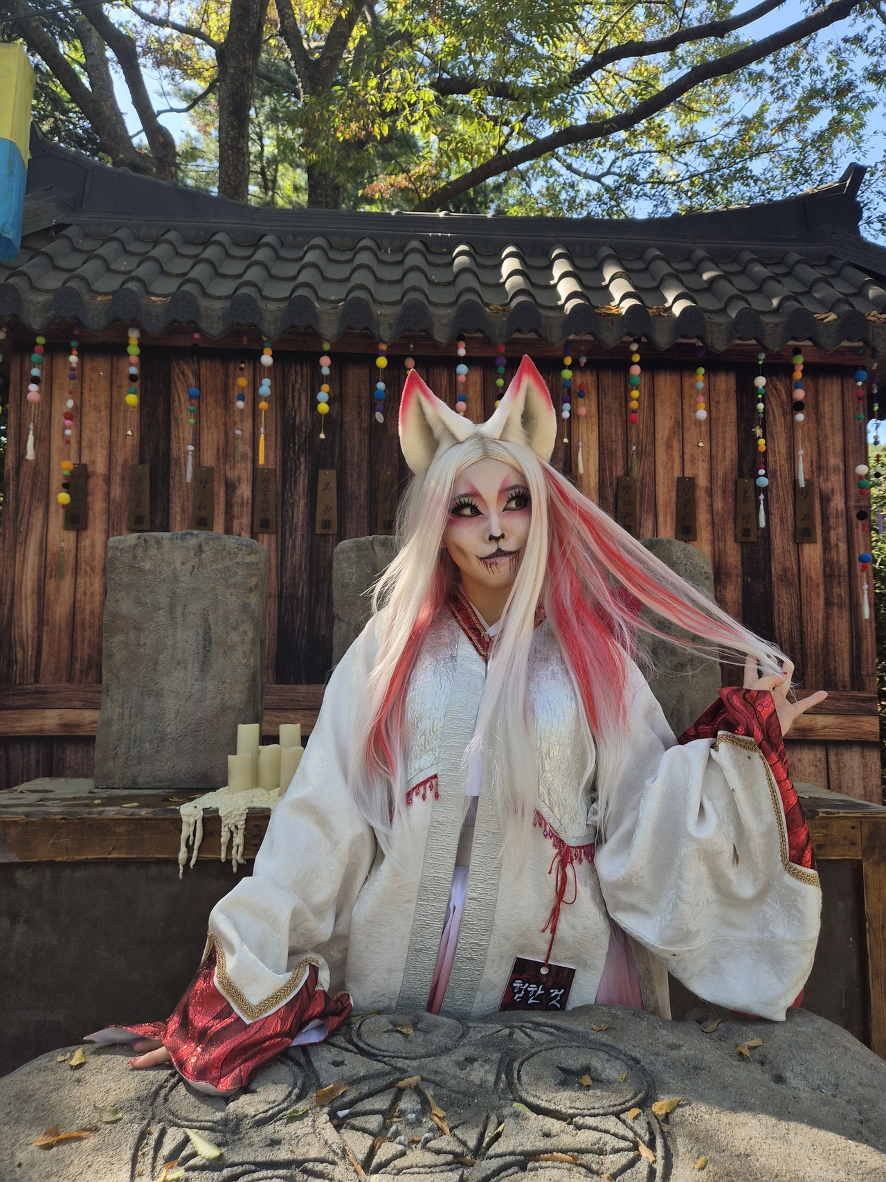 Bae Se-yeon, who plays a gumiho, or nine-tailed fox, at the Korean Folk Village, poses for a photo on Sept. 15. (Choi Jae-hee / The Korea Herald)