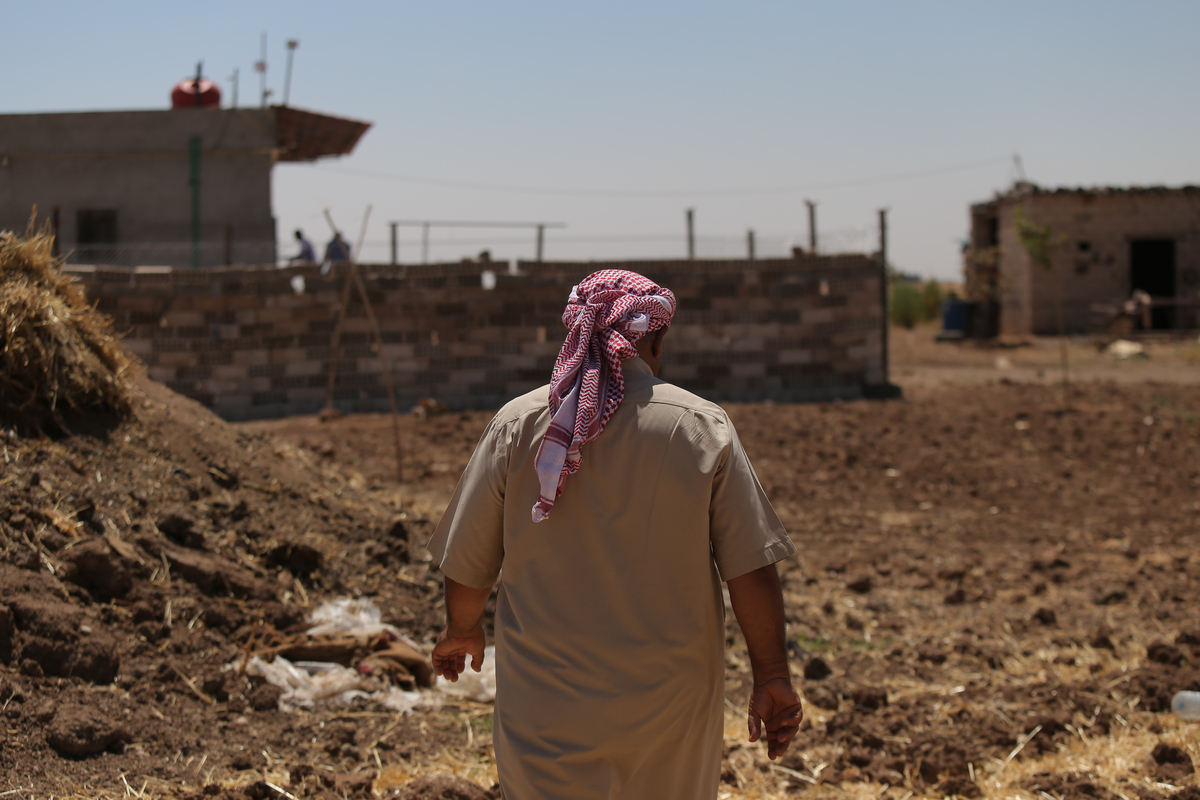 Anwar (pseudonym, 60), a farmer who has worked the land in northeastern Syria for 39 years. A father of four sons and five daughters, he took part in the IRC's Seed Security project, receiving financial support to purchase farming supplies and training in climate-adaptive agricultural techniques. [Provided by the International Rescue Committee]