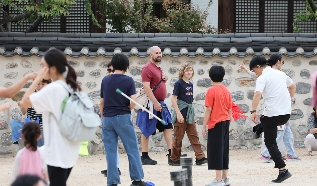 Namsangol Hanok Village in Seoul is crowded with visitors on Friday.  (Yonhap)