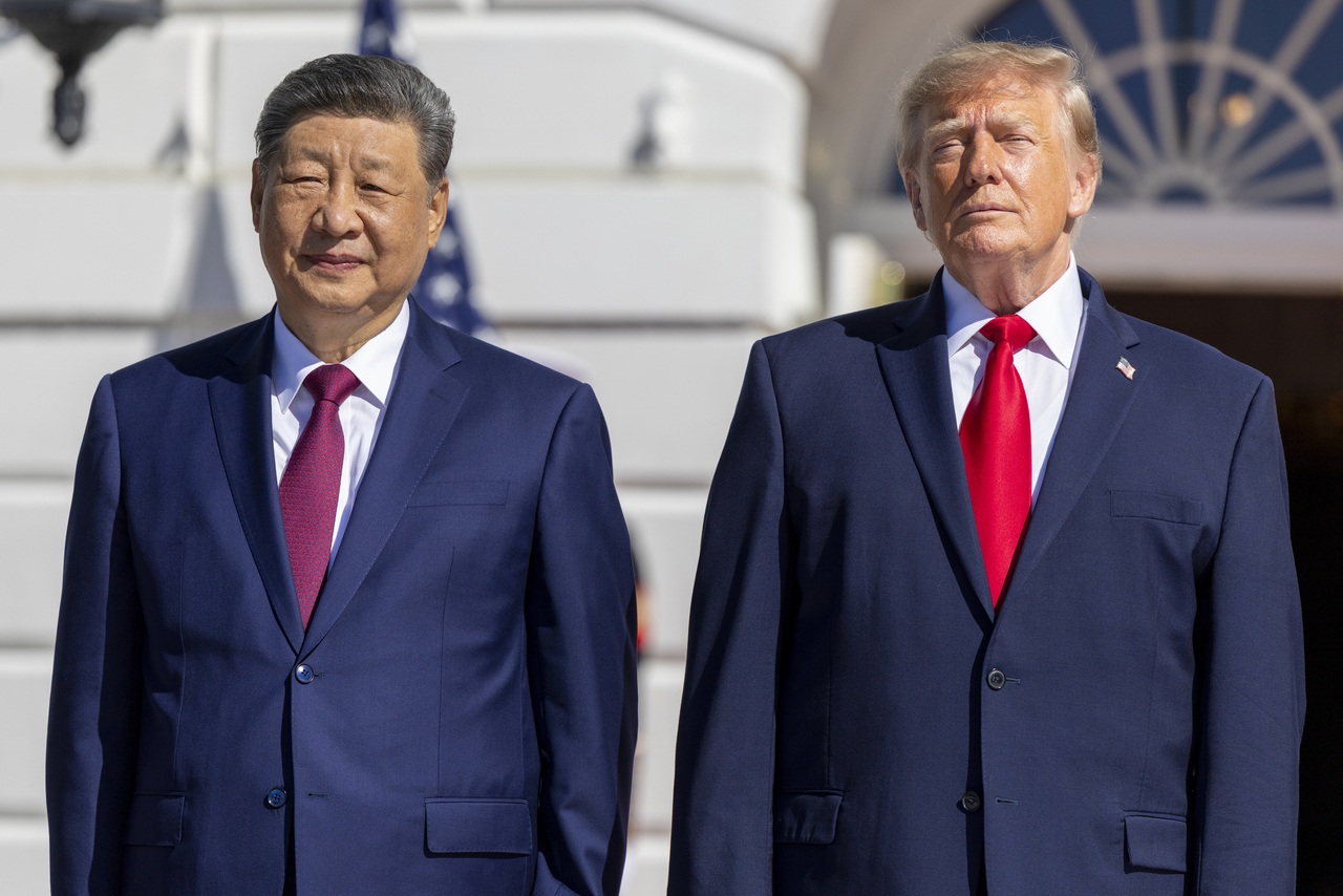 Chinese President Xi Jinping (left) and US President Donald Trump [UPI]