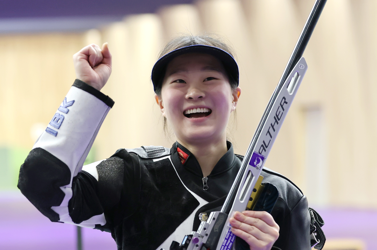 Kim Ji-eun of South Korea beams after winning the bronze medal in the women's 50m rifle 3 positions individual final at the 2026 Aichi-Nagoya Asian Games at the Aichi Prefecture General Shooting Range in Japan on Saturday. [Yonhap]