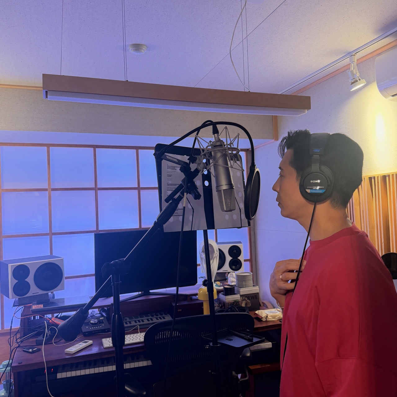 Brian is seen at a recording studio recording music for Fly to the Sky's upcoming comeback. (Thebrianjoo on Instagram)