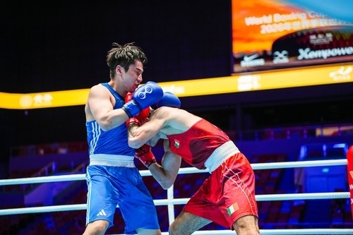 Kim Min-sung (left), who secured a bronze medal in boxing at the 2026 Aichi-Nagoya Asian Games [Korea Boxing Federation]