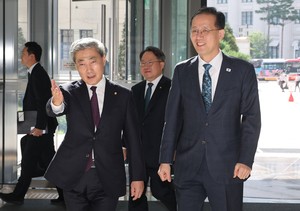 초고금리 속 만난 두 수장