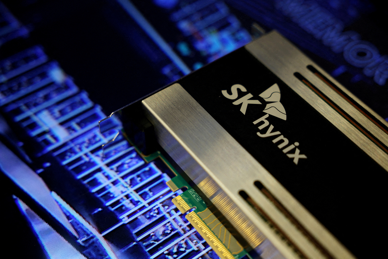 The SK hynix logo is stamped on one of its products during the 26th Semiconductor Exhibition in Seoul in October 2024. (Reuters-Yonhap)