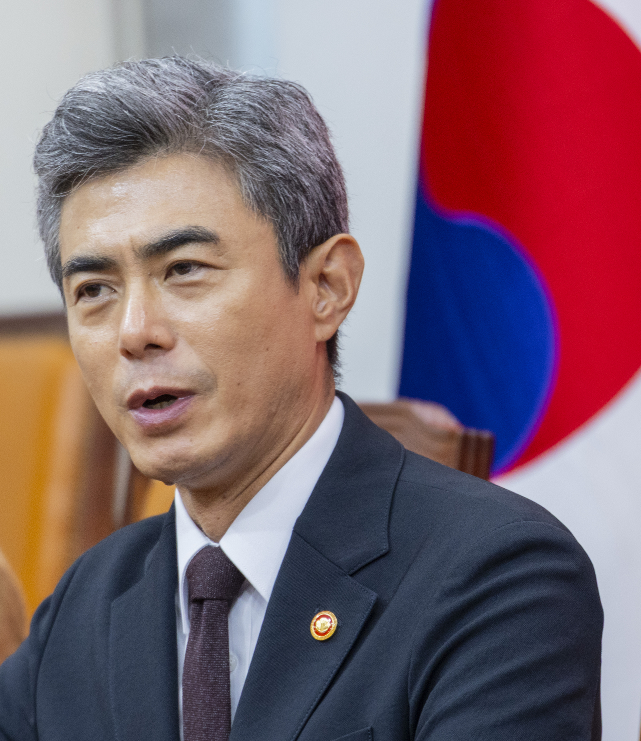 Defense Minister Kang Shin-chul speaks during a meeting with People Power Party Chair Rep. Jang Dong-hyeok at the National Assembly on Monday. (Yonhap)