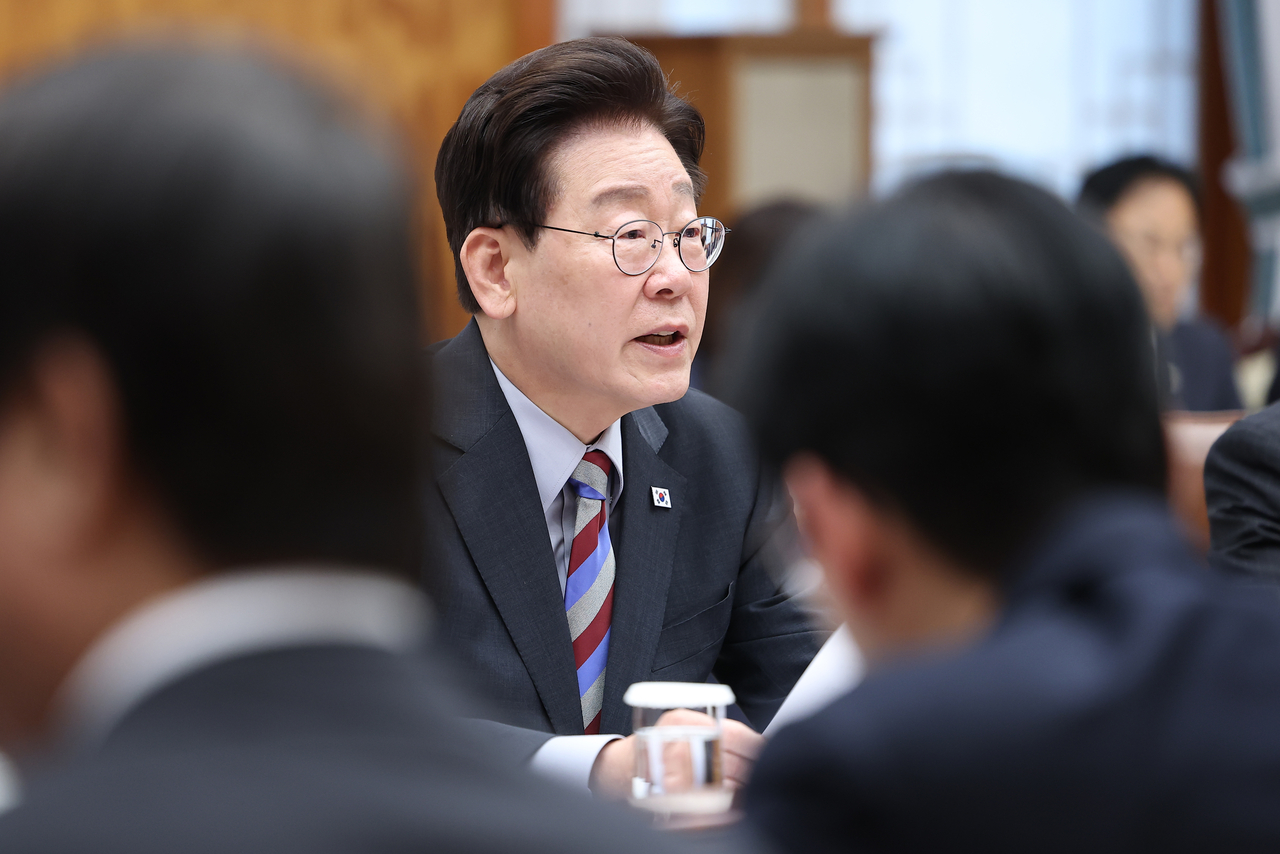 President Lee Jae Myung speaks during the third public-private review meeting on the megaprojects at Cheong Wa Dae on Tuesday. (Yonhap)