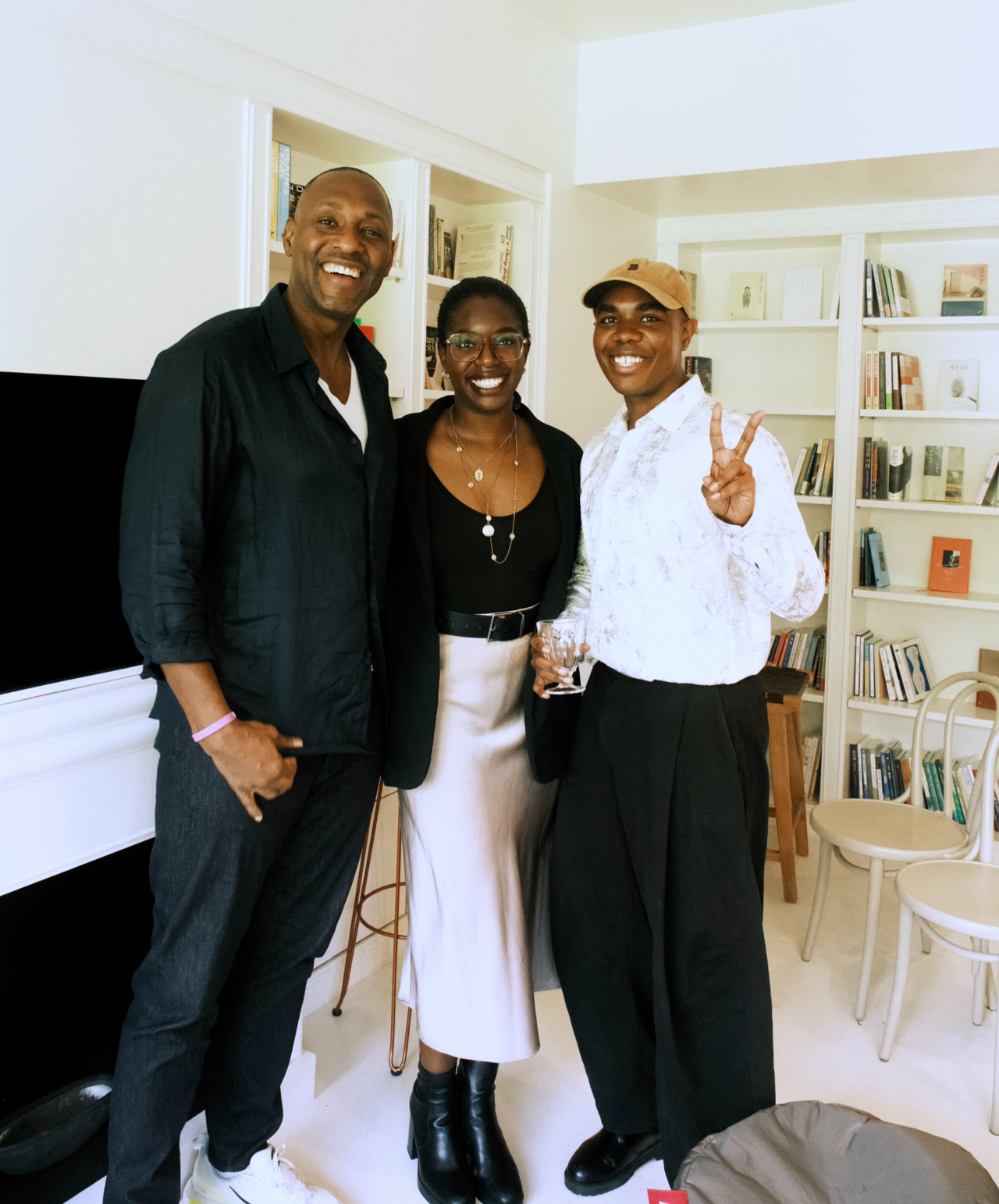 (From left) American actor Paul Pryce, Austrian writer, filmmaker  and the founder of Black Seoul Creatives Marie Noel and American actor Terris Brown pose for photos during the first meeting of Black Seoul Creatives on Sept. 20 in a cafe in Mapo-gu, Seoul. (Tim Baso)