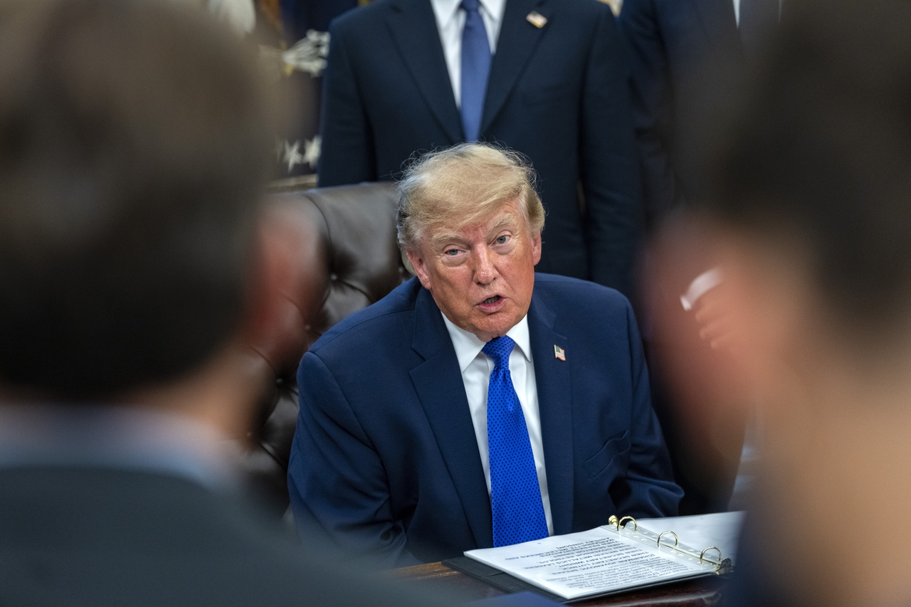 US President Donald Trump speaks in the Oval Office at the White House in Washington on Monday. Trump announced that Mesabi Metallics would invest about $15 billion to build the largest steel mill in US history in Iowa. [EPA]