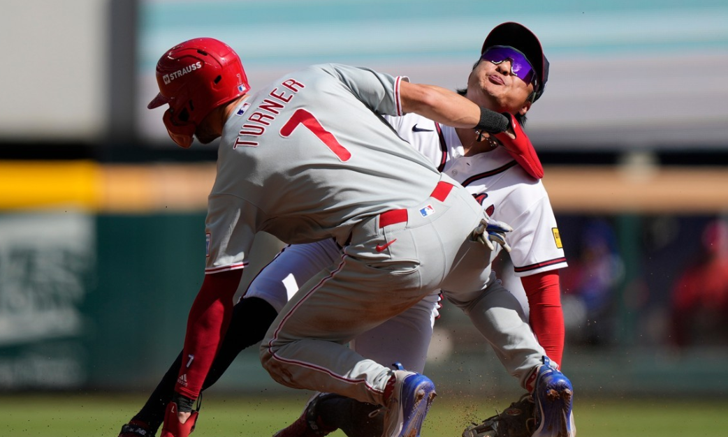 Kim Ha-seong collides with Trea Turner during a stolen-base attempt.   (AP-Yonhap)