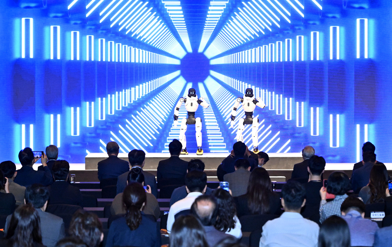 Y1 Ultra models from Il Robotics perform at the Herald Business Forum held at The Shilla Seoul on Tuesday. (Im Se-jun/The Korea Herald)