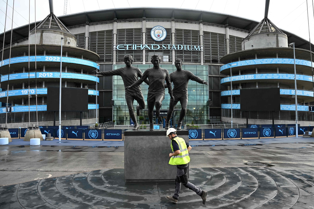 A statue of Manchester City legends Colin Bell, Francis Lee and Mike Summerbee is visible outside the Etihad Stadium, the home ground of Manchester City, in Manchester, England, Wednesday.    (AFP-Yonhap)