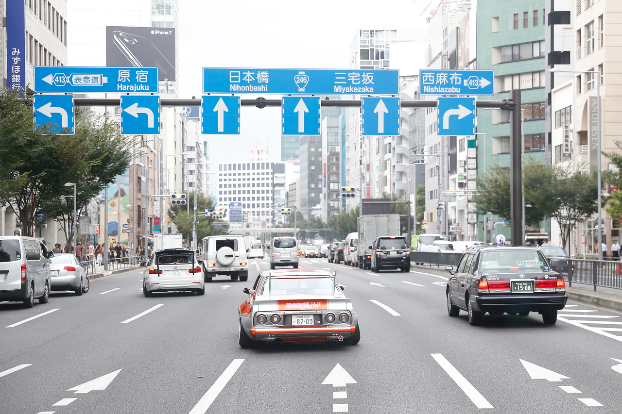 Vehicles travel through central Tokyo. [Getty Images]