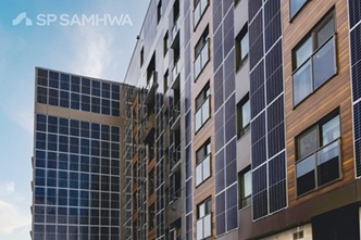 An apartment building fitted with building-integrated photovoltaic modules.