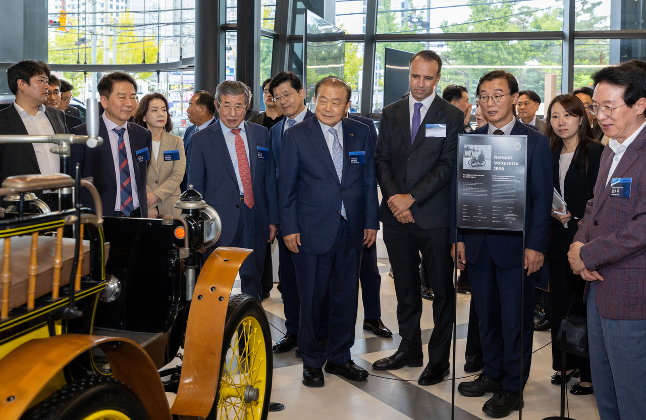 Key attendees view vehicles on display at the Renault Dongnae opening ceremony held Thursday. [Renault Korea]