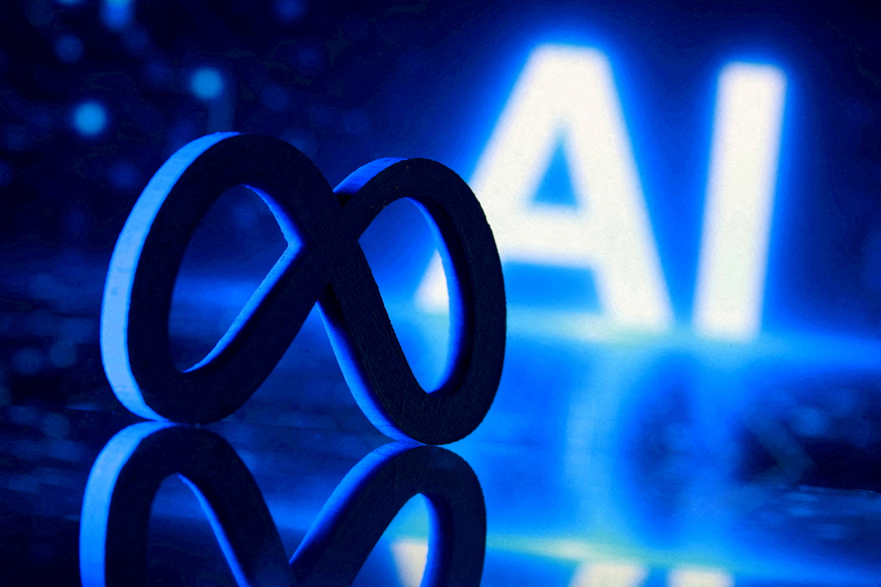 A 3D-printed Meta logo and word "AI" are seen in this illustration.   Reuters-Yonhap