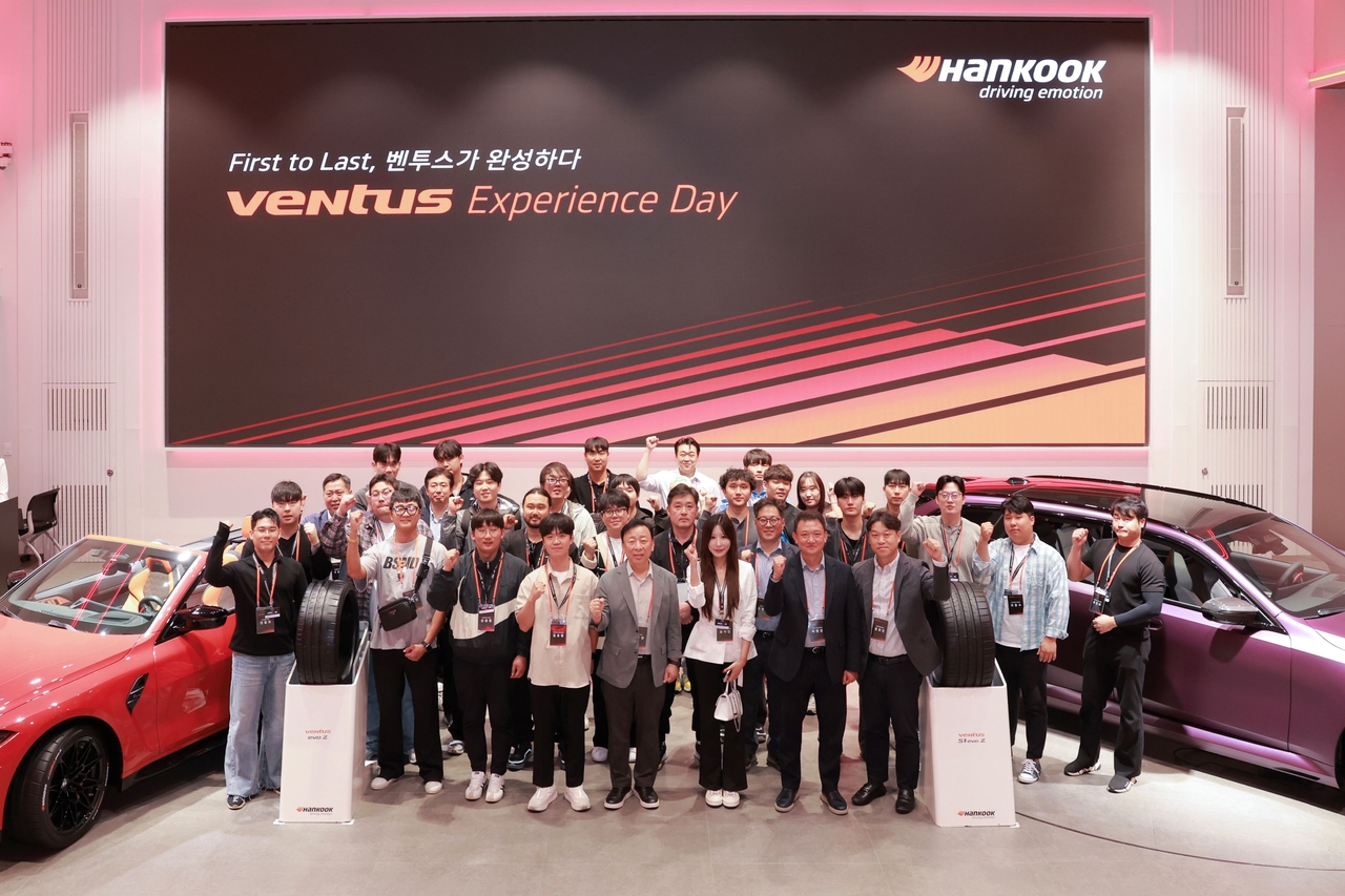 Participants pose for a group photo at the 2026 Ventus Experience Day. [Hankook Tire & Technology]